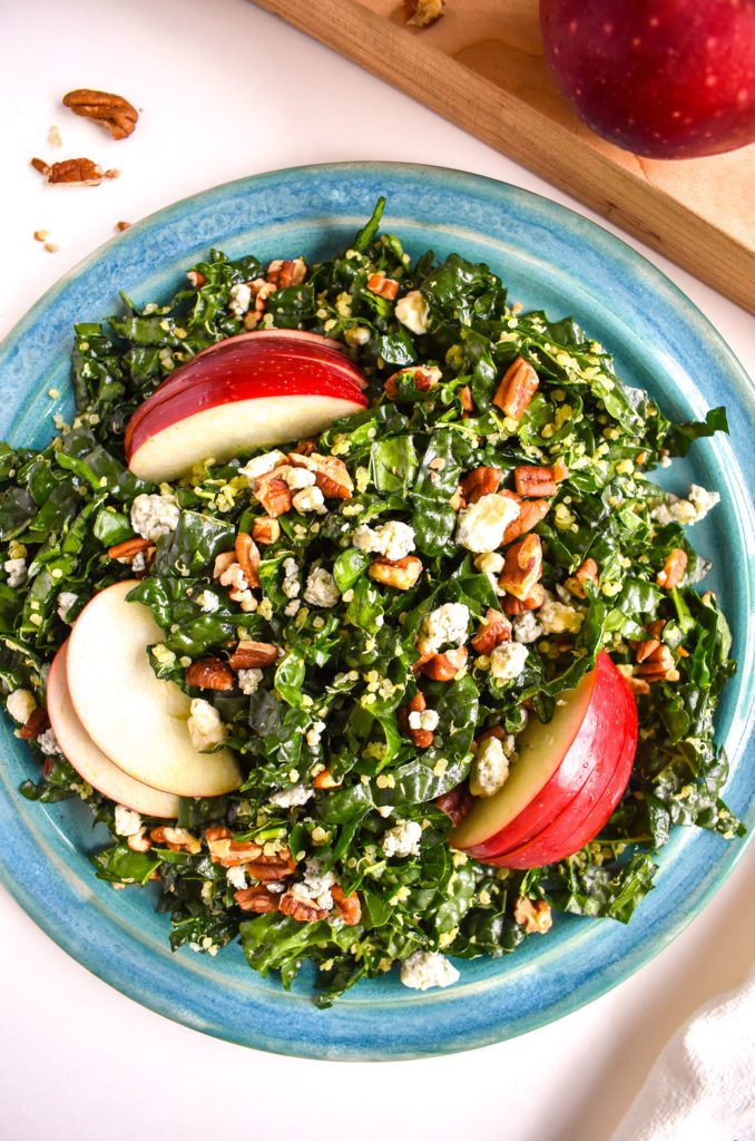 Kale quinoa apple salad in bowl
