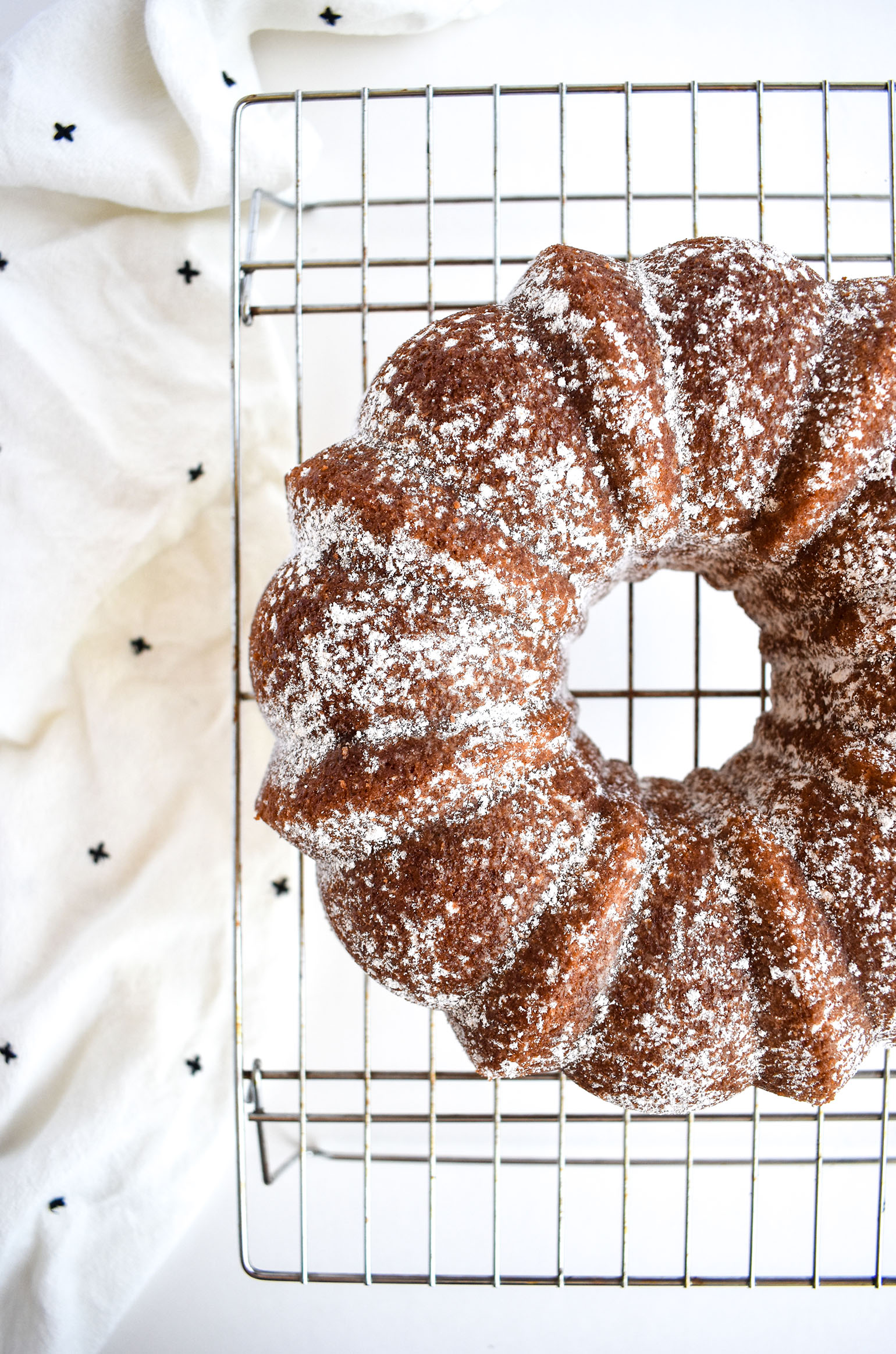 Spiced chai bundt cake on cooling rack